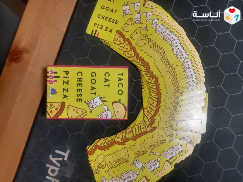 لعبة Taco Cat Goat Cheese Pizza: إعصار الضحك، صراع الأيدي، وفن الصفعة الذهبية